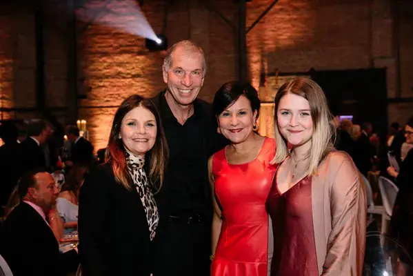 Kathryn Erbe, trustee Bryan Traubert, Penny Pritzker and Maeve Kinney family picture.