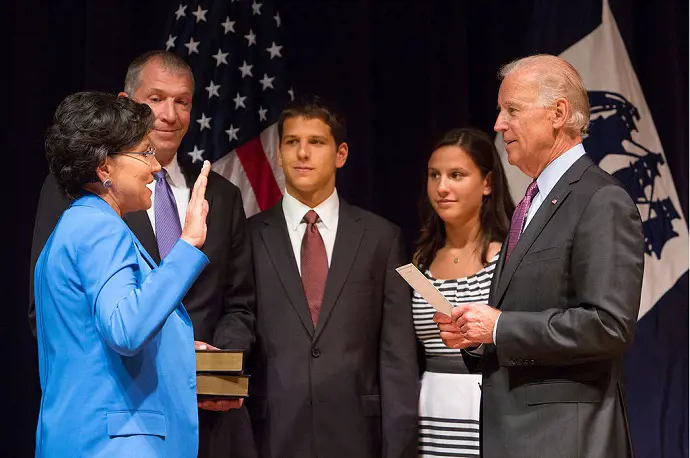 Vice President Joe Biden swears in Penny Pritzker as Secretary of Commerce, at the Department of Commerce in Washington, DC, June 26, 2013.