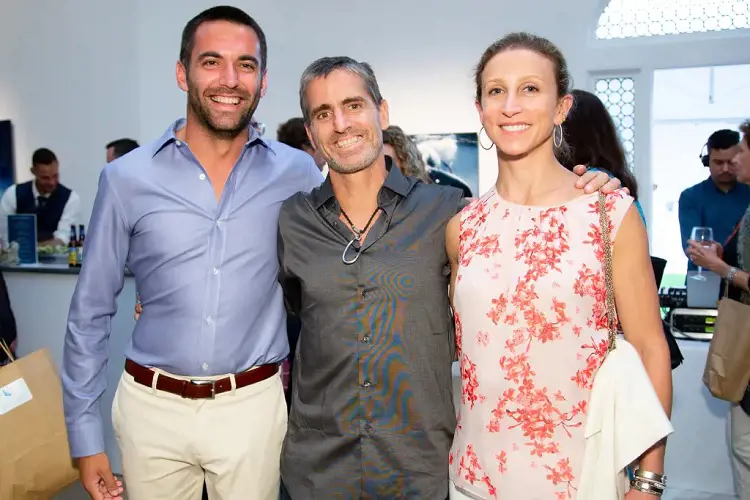 Jeremiah Kittredge (left) with Shawn Heinrichs, (center) and Emma Bloomberg.