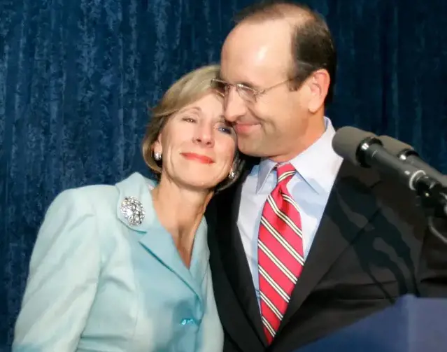 Betsy DeVos and Dick DeVos showed their affection in front of many people.