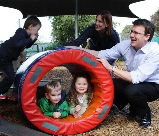 Alan Tudge's ex- wife Teri Etchells and their three children.