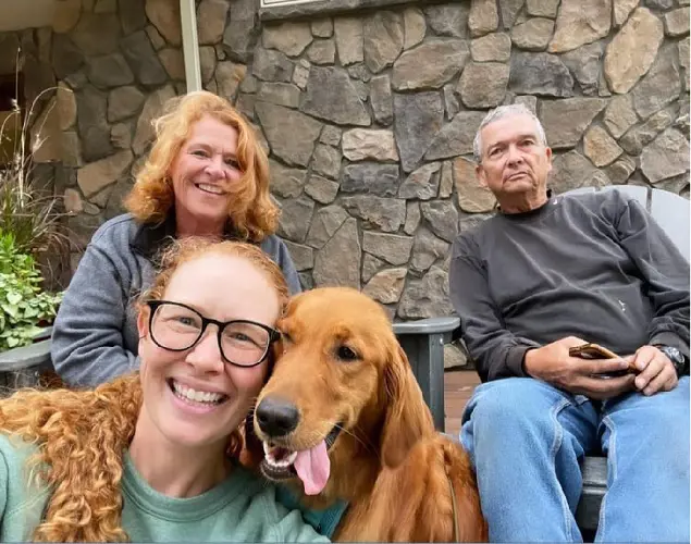  Darwin Lange and Heidi Heitkamp with their daughter.