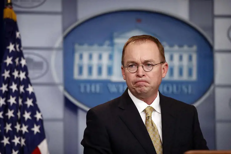    Mulvaney pauses while speaking during a press briefing at the White House on Saturday, Jan. 20, 2018, in Washington, D.C. 
